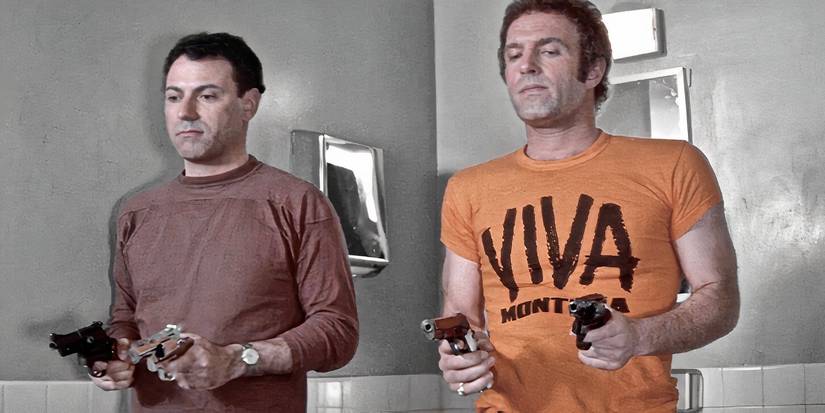 Alan Arkin and James Caan hold guns in Freebie and the Bean.