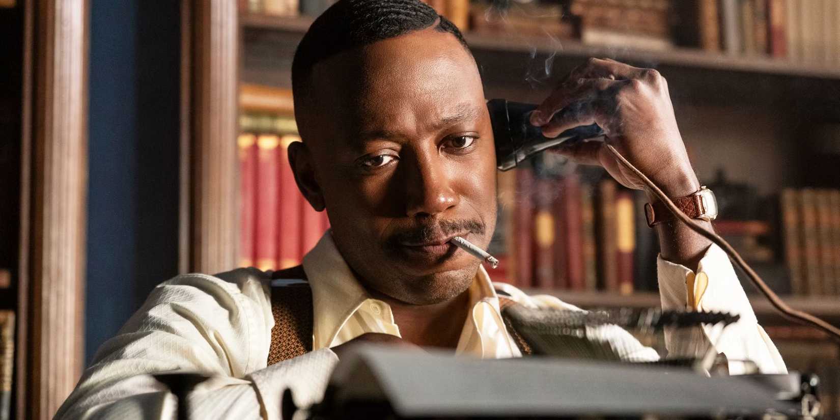 Lamorne Morris smiling with a cigarette in Spider-Noir