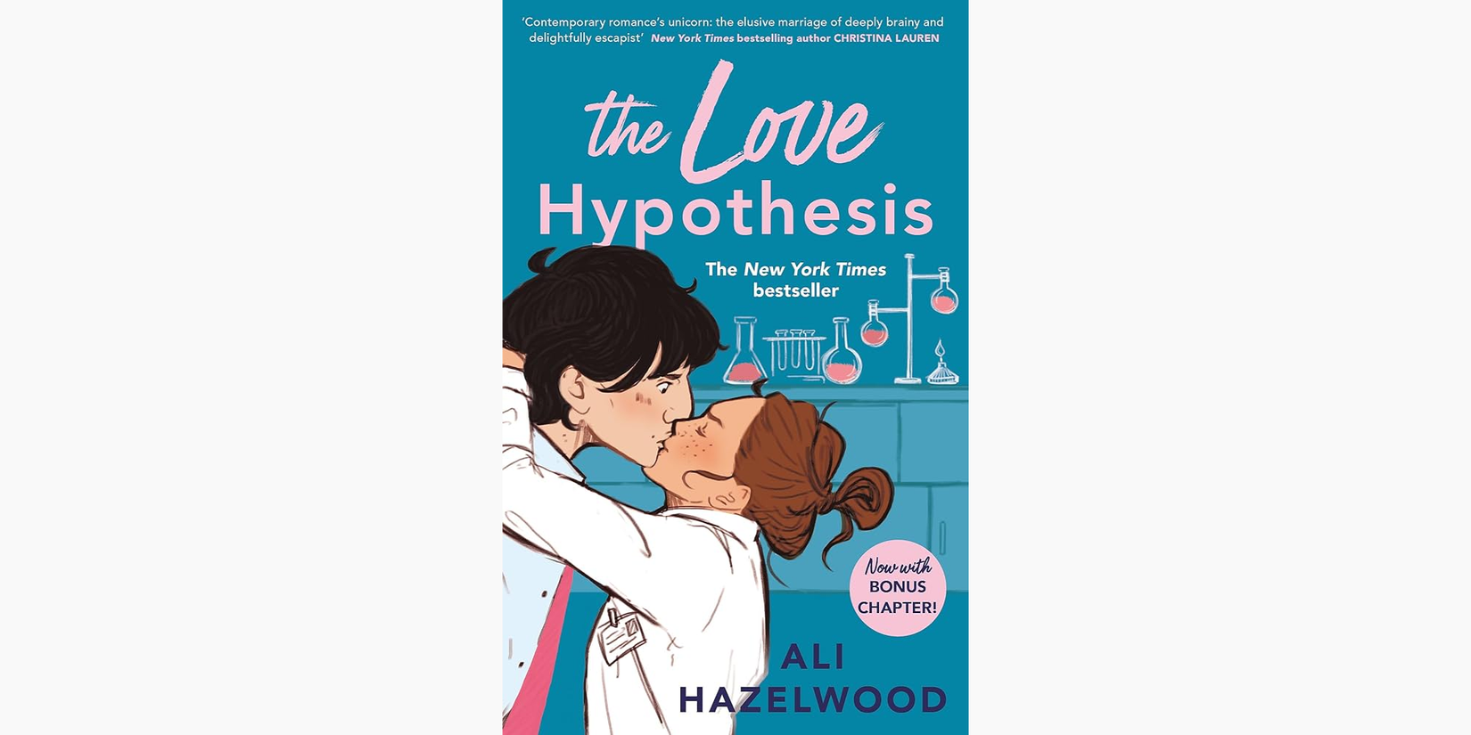 A man and a woman wearing lab coats kiss on the lips on the cover of 'The Love Hypothesis'