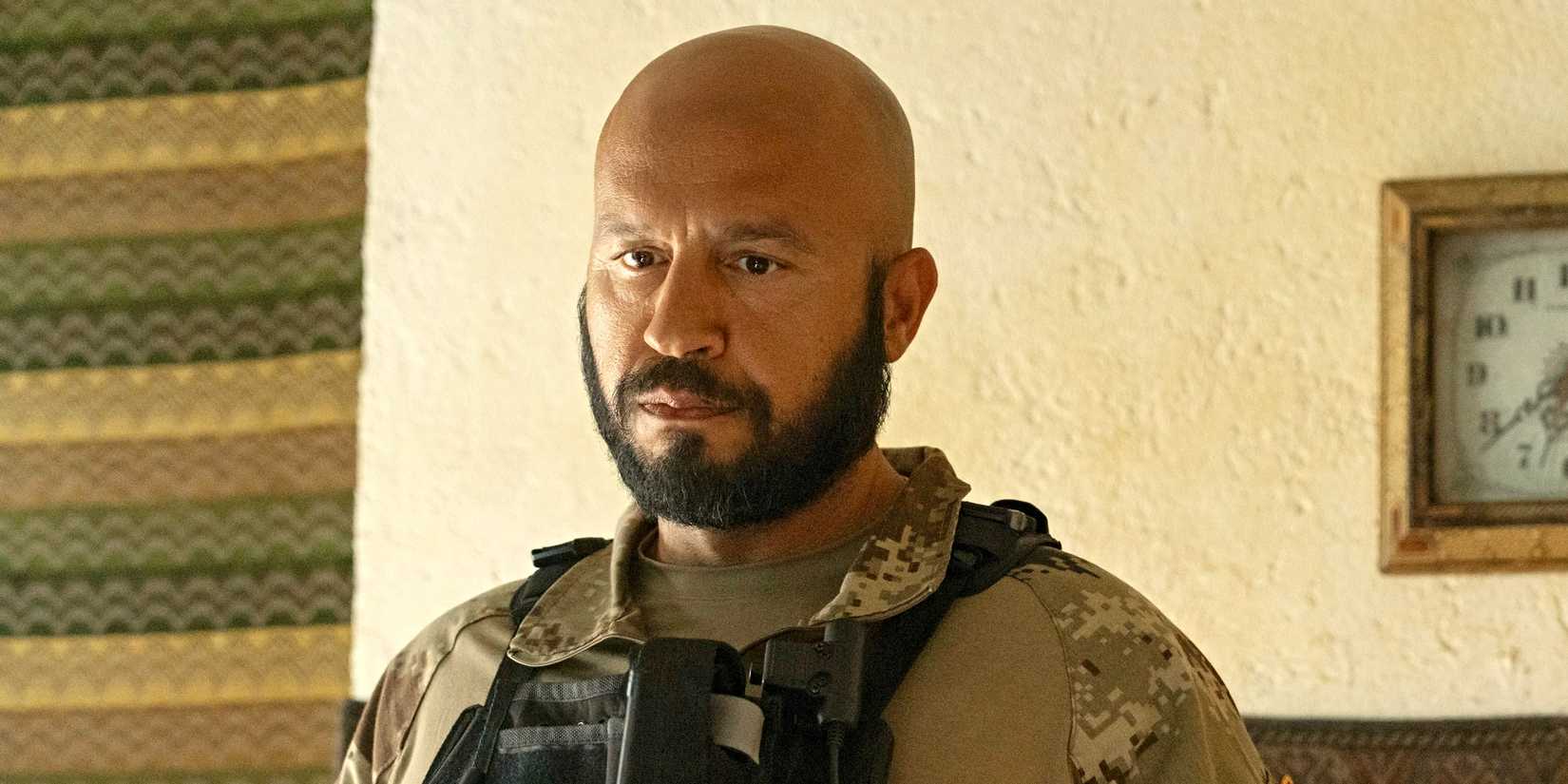 Dar Salim as Mo Farooq looking thoughtful in The Terminal List: Dark Wolf