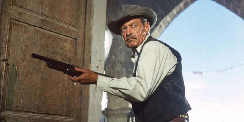 A man holding a rifle in The Wild Bunch