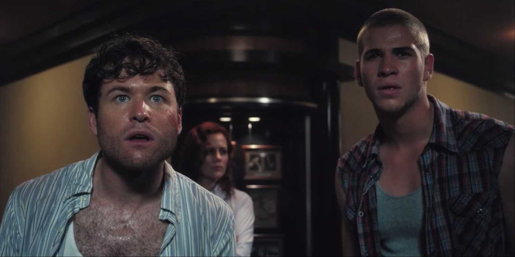 Liam Hemsworth as Victor, Henry Nixon as Downey, and Rachael Carpani as Sally examine the ship in Triangle
