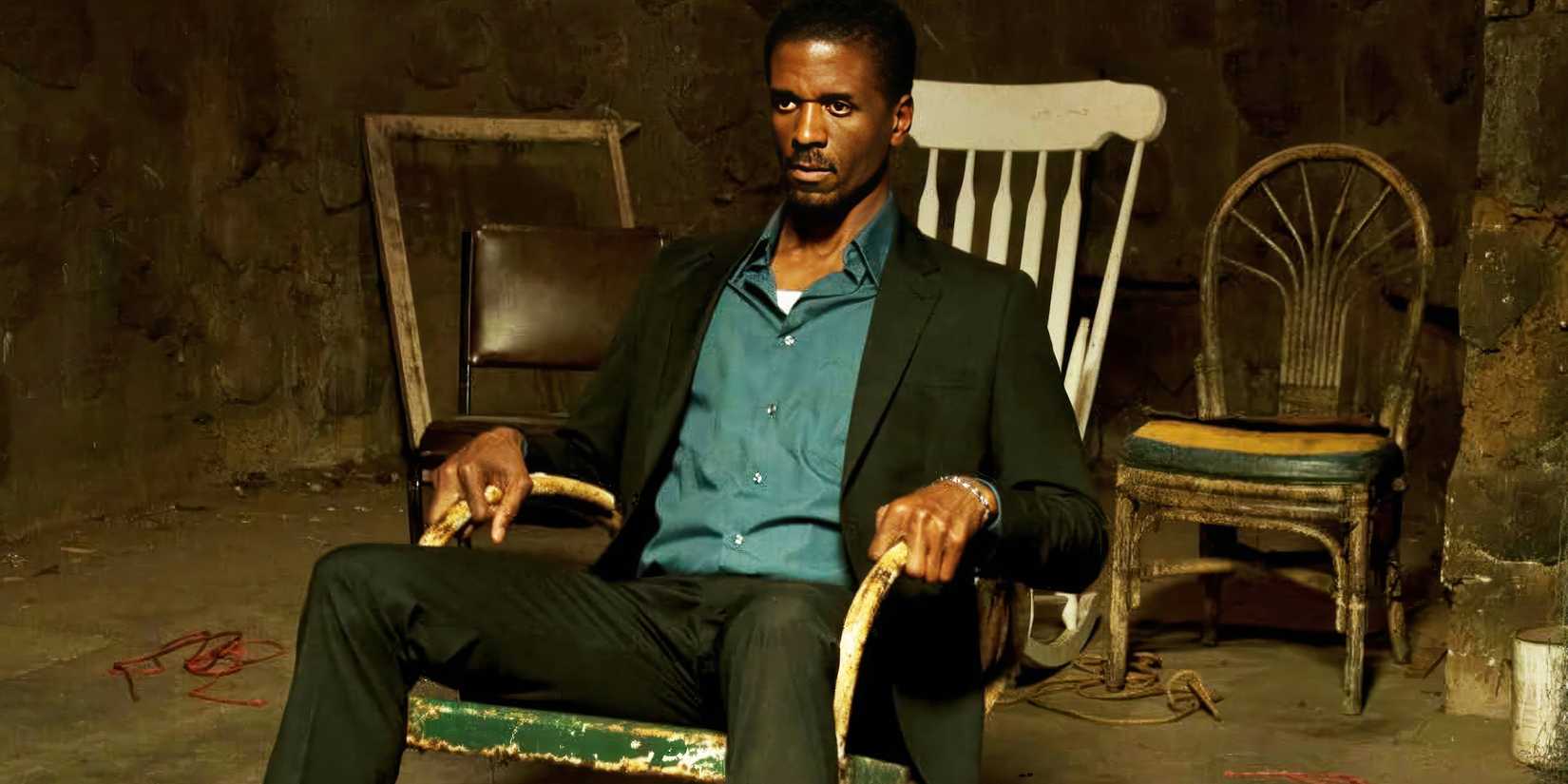 A man sitting in a chair in Vile. 
