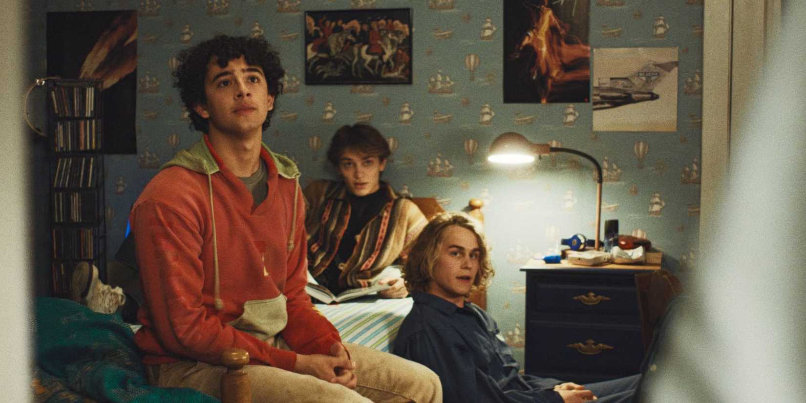 Evan, Gil, and PJ sitting together in 'Widow's Bay'