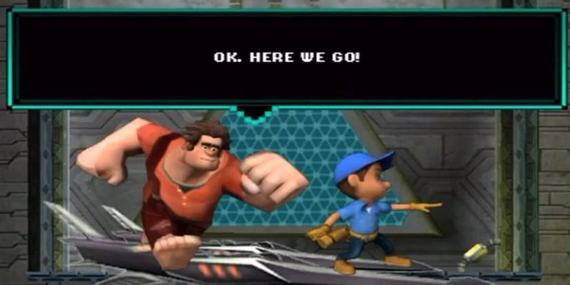 Low polygon models of Ralph and Fix-It Felix in a cutscene saying "Ok. Here We Go!" in a text box in the video game version of 'Wreck-It Ralph'