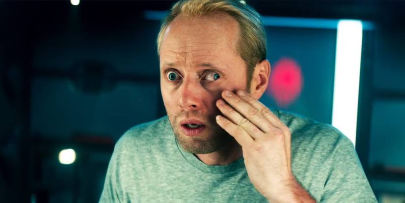 Volkov (Aksel Hennie) looking at his eye in the mirror in 'The Cloverfield Paradox.'