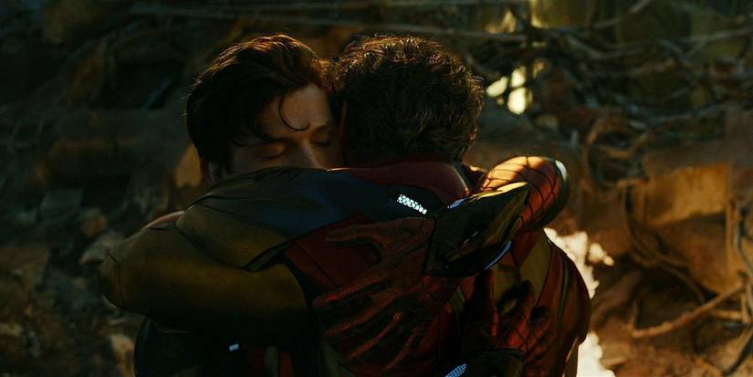Peter Parker (Tom Holland) and Tony Stark (Robert Downey Jr.) hugging in 'Avengers: Endgame'