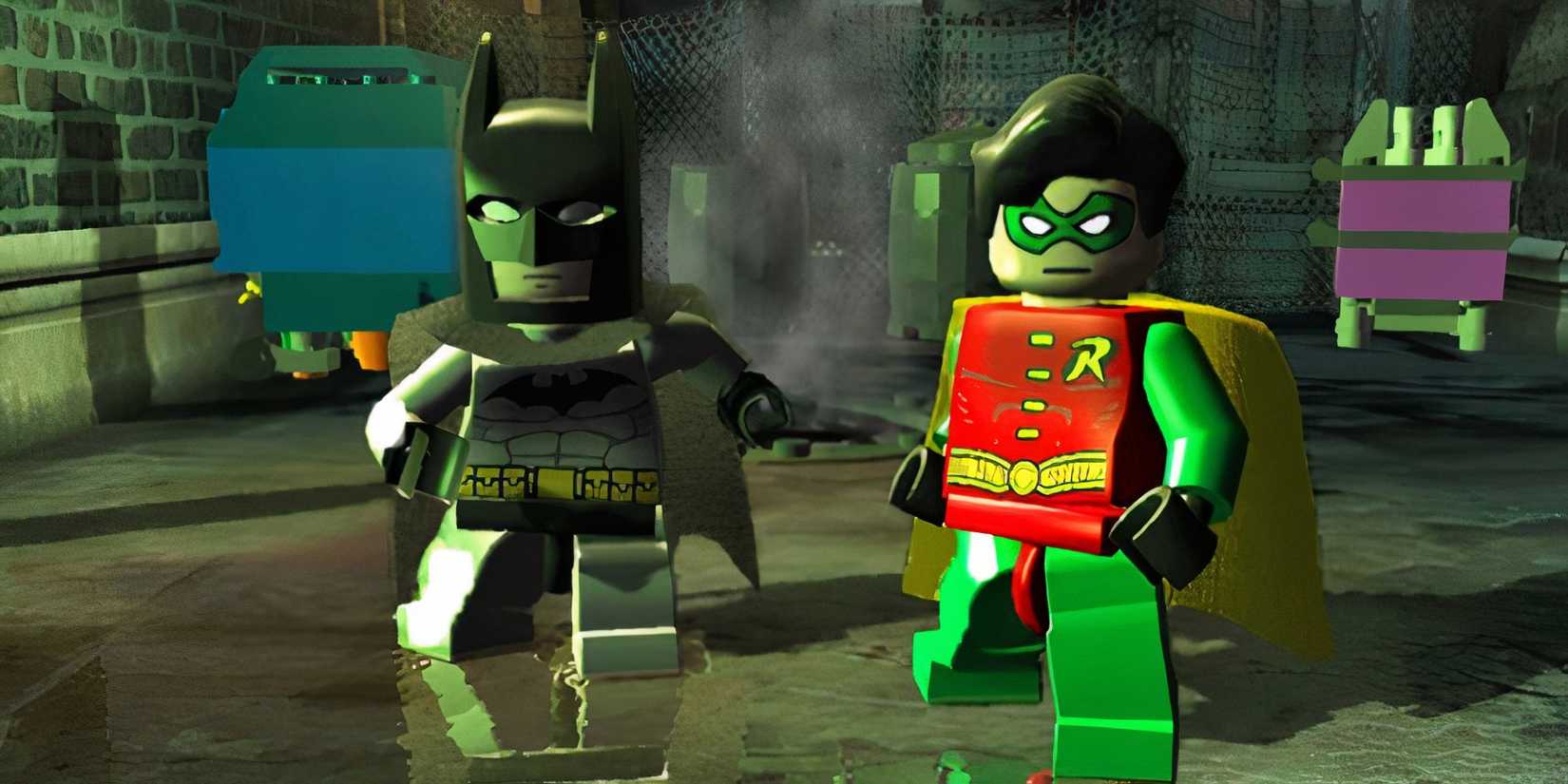 Batman and Robin standing on a wet street in Lego Batman: The Video Game