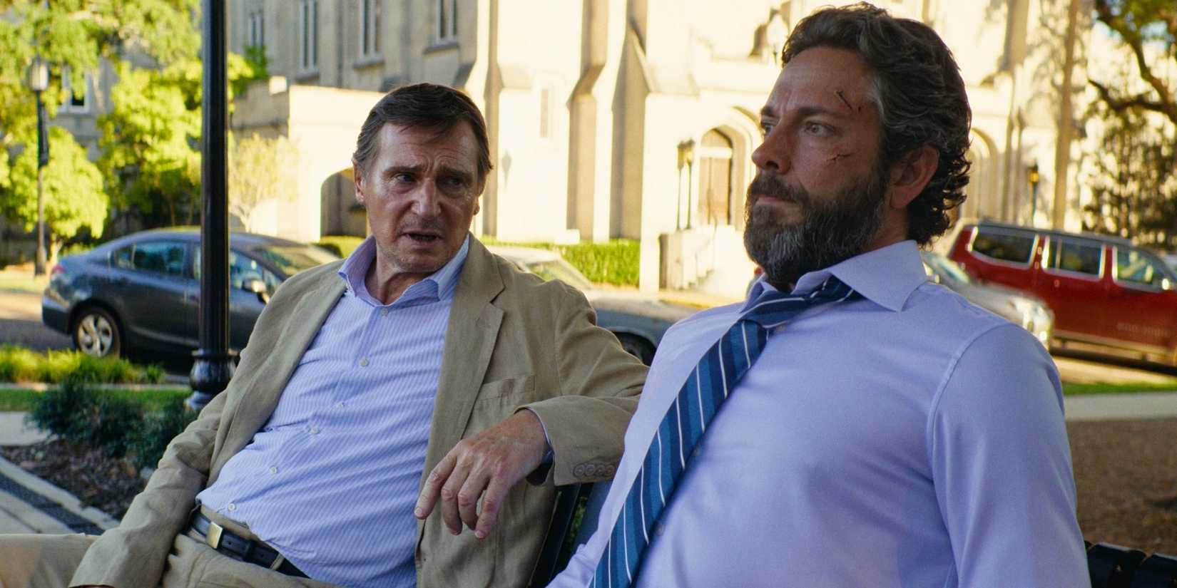Liam Neeson and Zachary Levi in The Fix