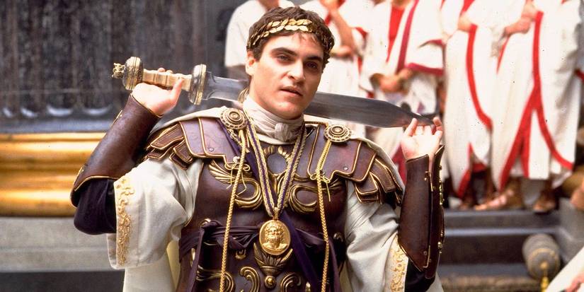 Joaquin Phoenix as Commodus with a sword around his shoulders in 'Gladiator'