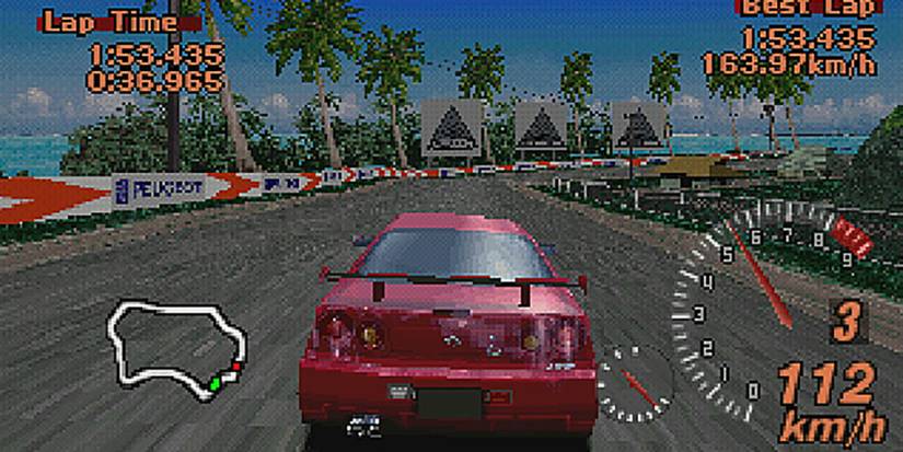 A red car racing on the street on Gran Turismo 2 for the Playstation 1.