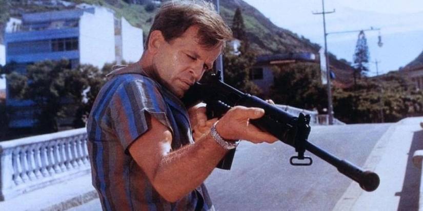 A man holding a sniper in 'Grand Slam'