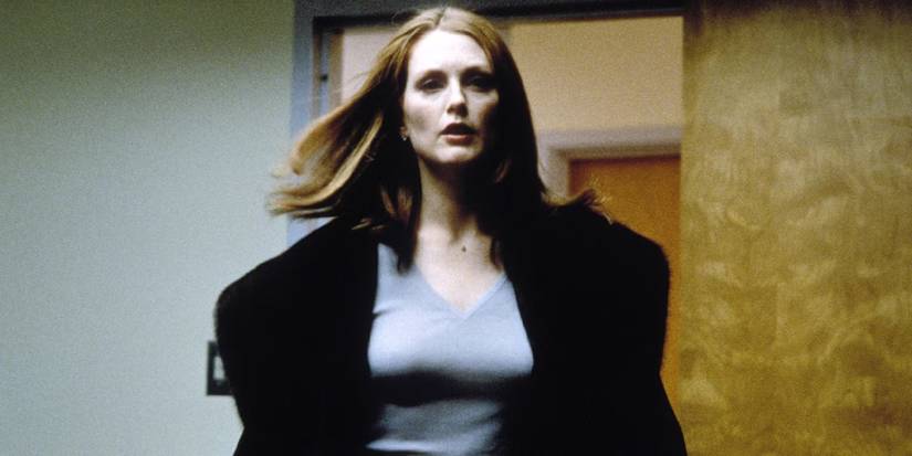 Julianne Moore as Linda Partrisde walking ahead in Magnolia (1999).