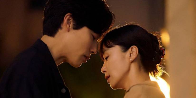 Jeon Do-yeon and Ryu Jun-yeol standing near each other face to face in the K-drama Lost