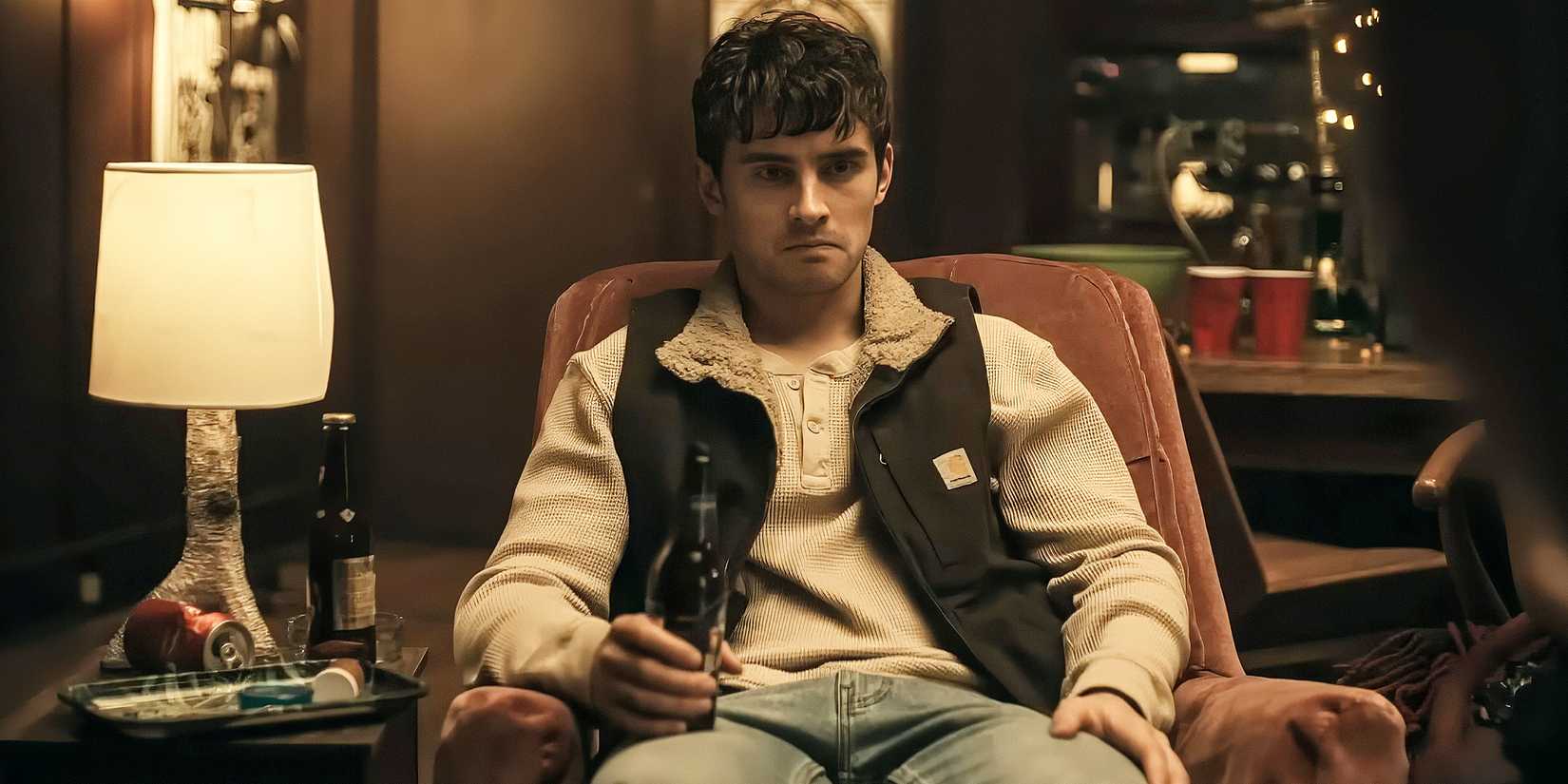 Bear sitting in a chair in Obsession.