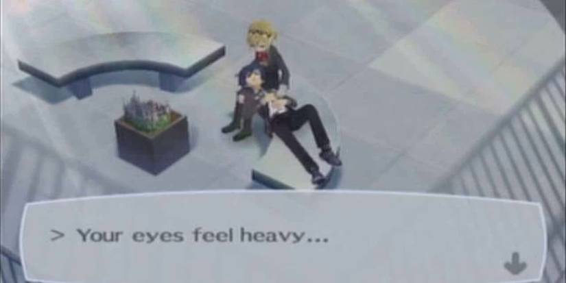 The protagonist of Persona 3 resting their head on Aigis's lap as they are about to die in the ending to 'Persona 3' (2006)