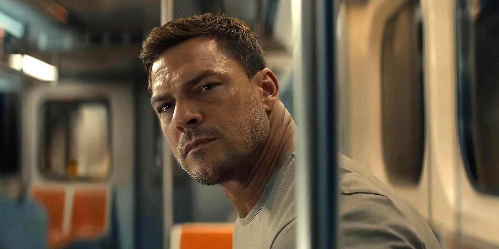 Reacher looking intently to his left