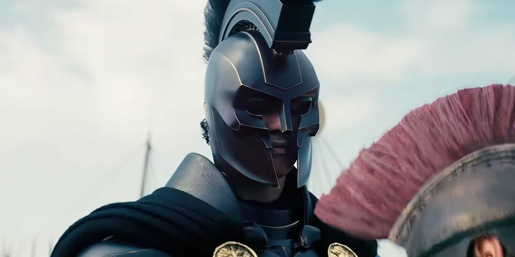 Agamemnon (Benny Safdie) wearing matte black armor in The Odyssey