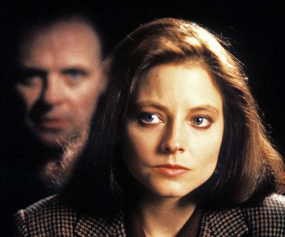 Clarice Starling and Hannibal Lecter's reflection on a window