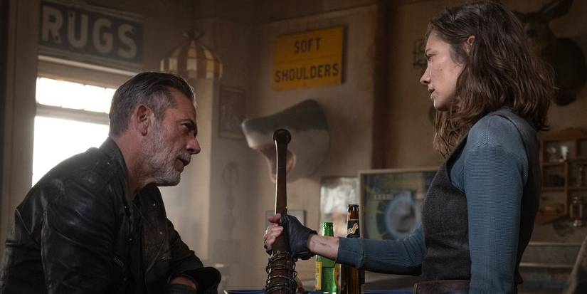 Maggie (Lauren Cohan) hands a bat to Negan (Jeffrey Dean Morgan) in 'The Walking Dead: Dead City'