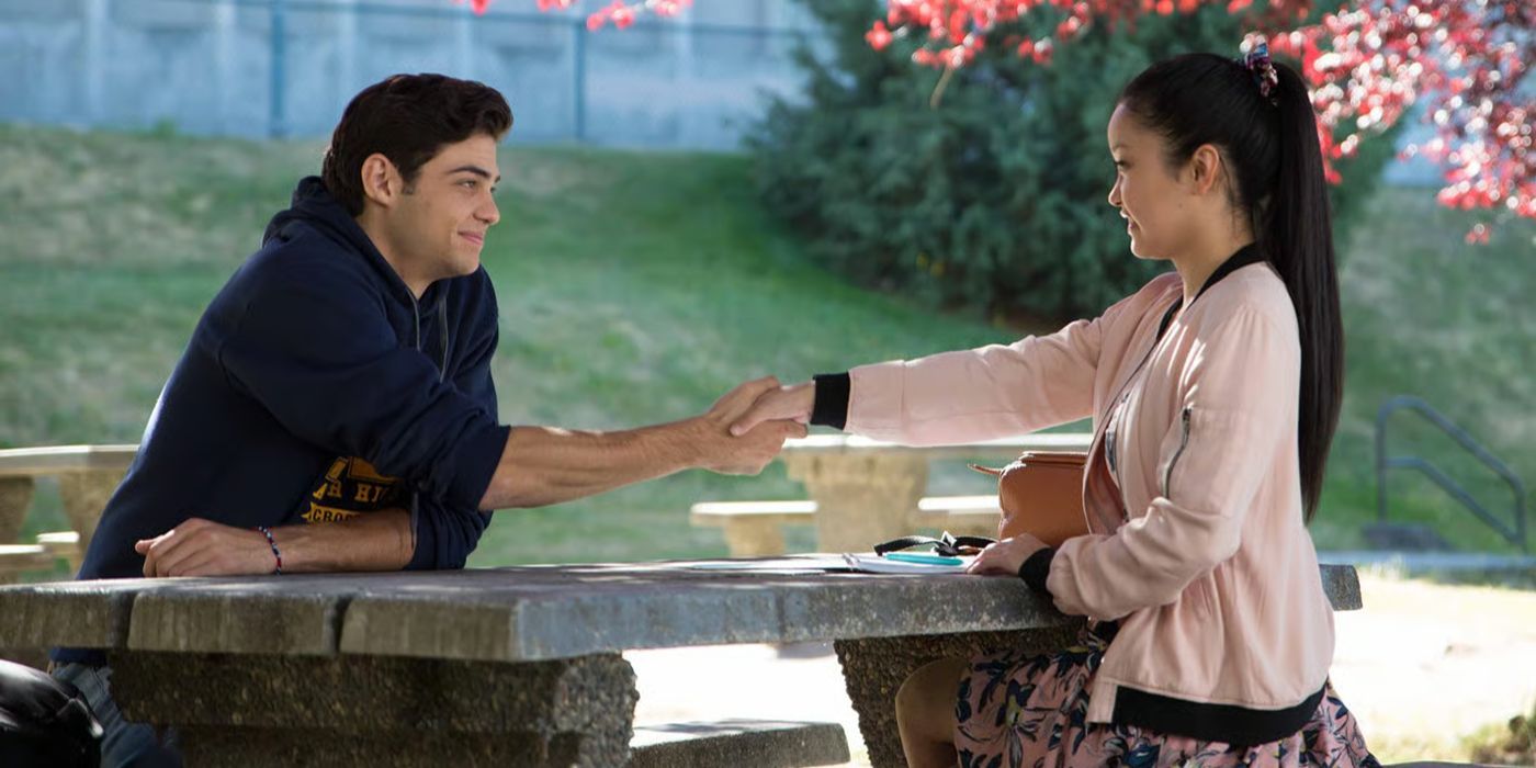 Noah Centineo and Lana Condor shaking hands in 'To All the Boys I've Loved Before'