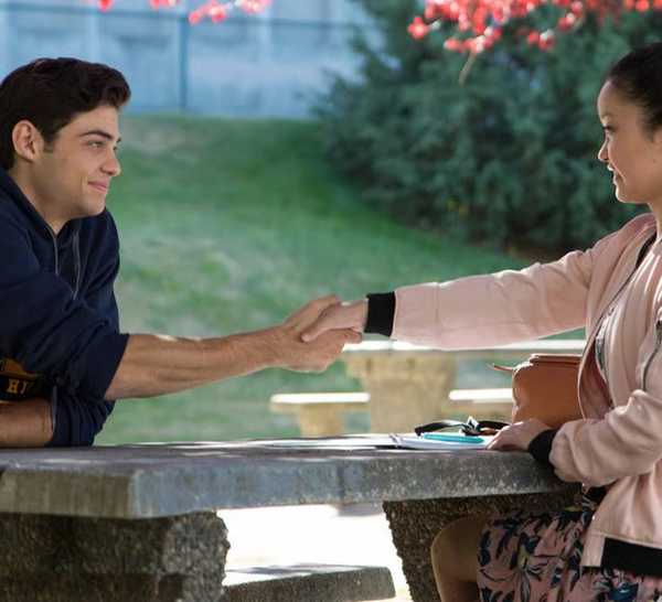 Noah Centineo and Lana Condor shaking hands in 'To All the Boys I've Loved Before'