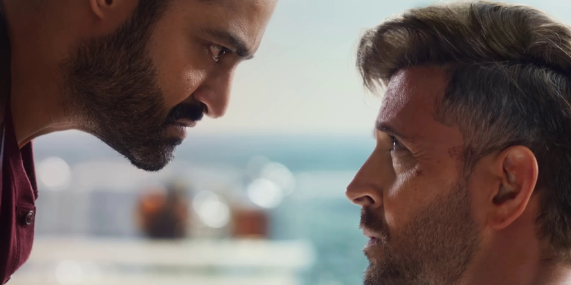 Two men intensely look at each other