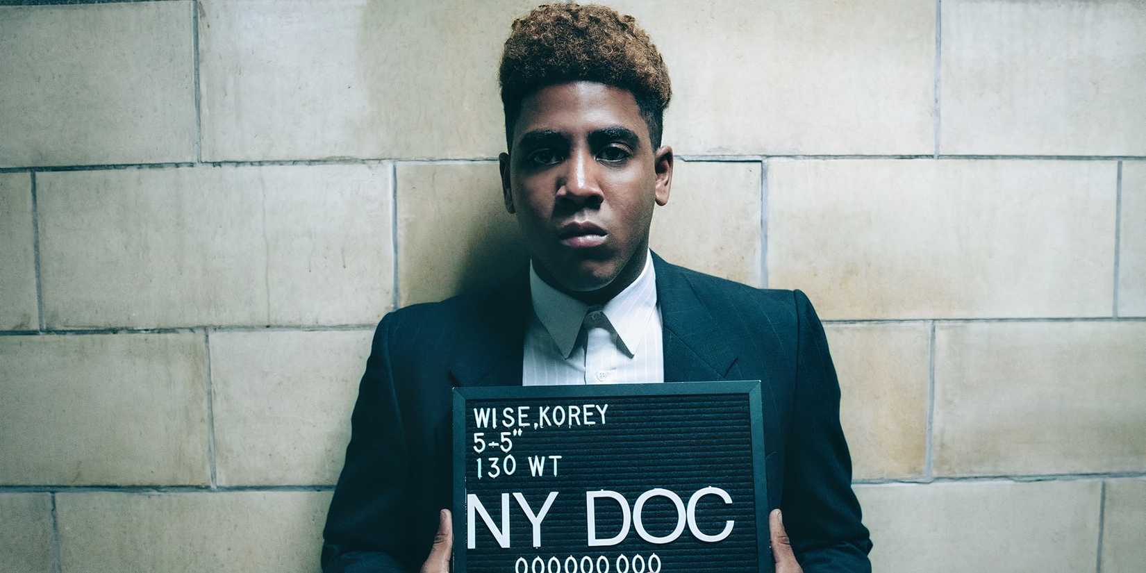 Korey Wise (Jharrel Jerome), taking a mug shot in “Part Four” of When They See Us.