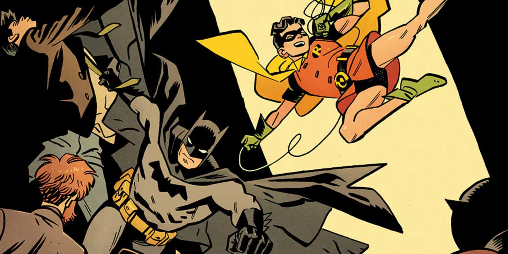 Batman and Robin battle criminals together on the cover of 'Batman & Robin: Year One'