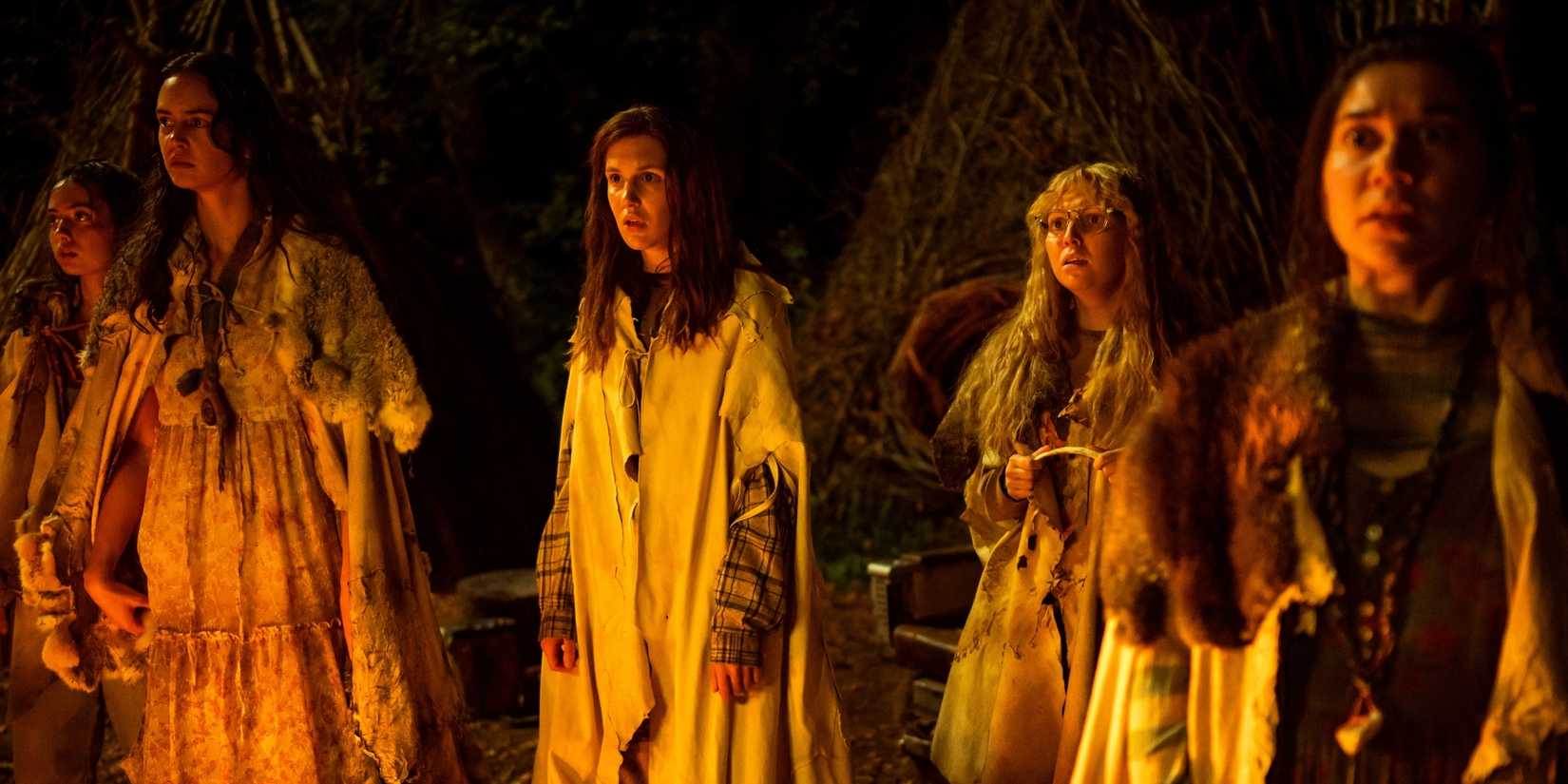L-R: Anisa Harris as Teen Robin, Courtney Eaton as Teen Lottie, Sophie Nélisse as Teen Shauna, Samantha Hanratty as Teen Misty and Vanessa Prasad as Teen Gen in Yellowjackets, epis