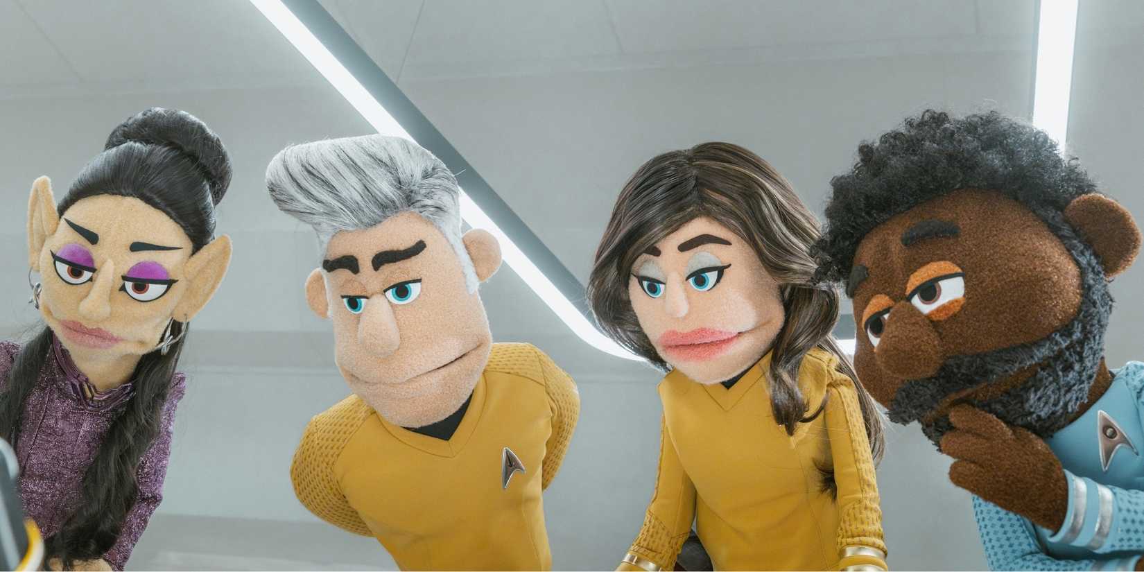 (L-R): Gia Sandhu as T'Pring, Anson Mount as Captain Pike, Rebecca Romijn as Una, and Babs Olusanmokun as Dr. M’Benga in season 4, episode 5, of Star Trek: Strange New Worlds streaming on Paramount+, 2026. Photo Credit: Jan Thijs/Paramount+