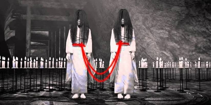 Twin girls in white kimonos stand side-by-side, connected at the waist by a bright red cord.