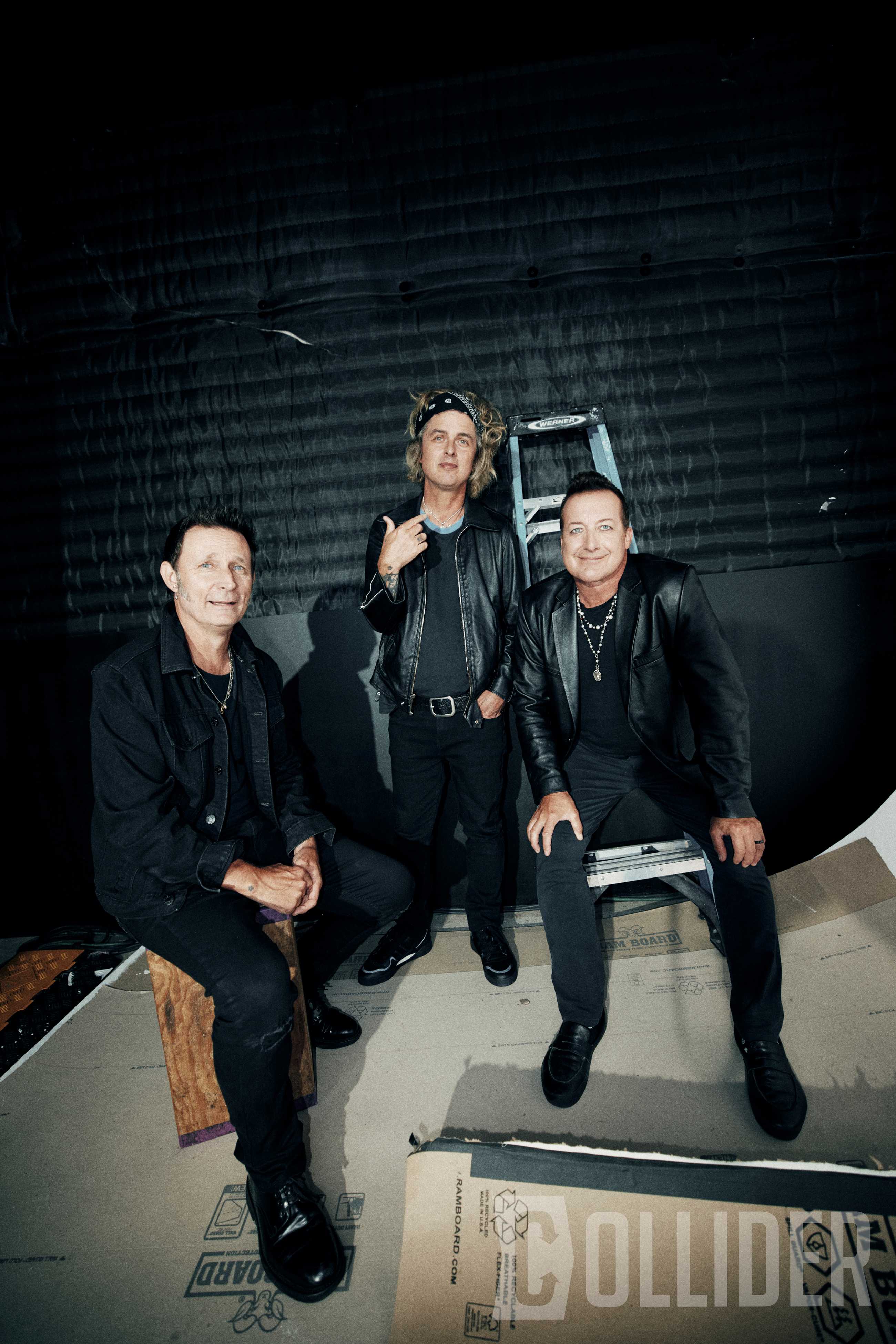 Green Day members Mike Dirnt, Billie Joe Armstrong and Tré Cool pose for an exclusive Collider portrait at BuzzFeed Studios in Los Angeles on July 14, 2026. (Photo by Sela Shiloni for Collider)