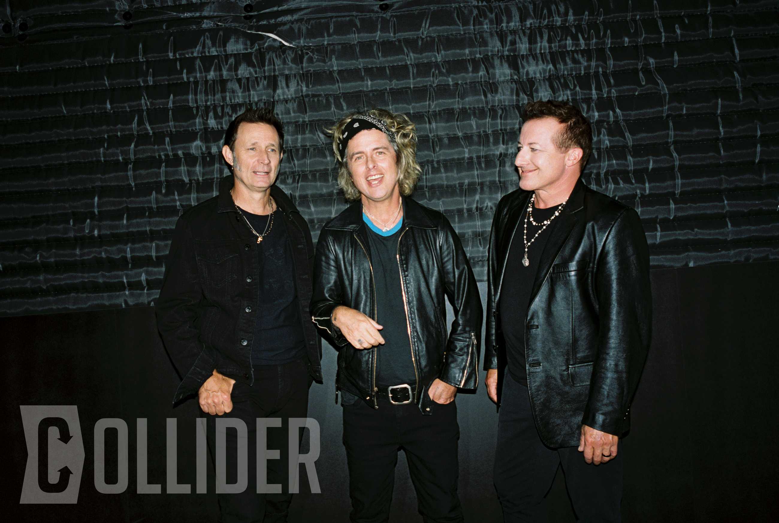 Green Day members Mike Dirnt, Billie Joe Armstrong and Tré Cool pose for an exclusive Collider portrait at BuzzFeed Studios in Los Angeles on July 14, 2026. (Photo by Sela Shiloni for Collider)