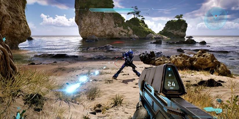 Shooting an alien on the beach in Halo: Campaign Evolved