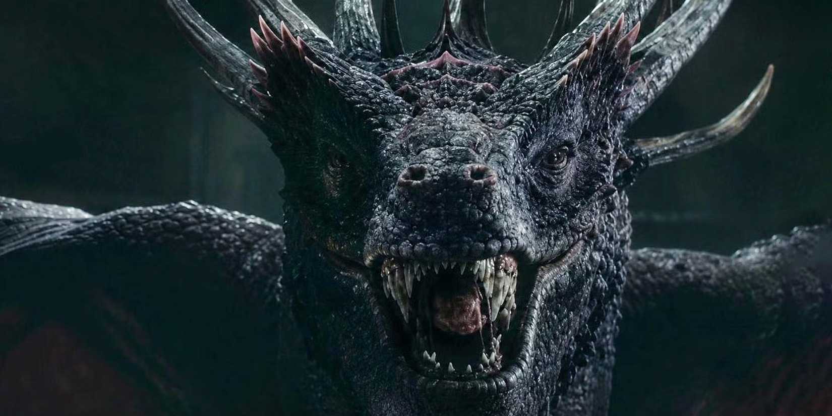 A close-up of Dreamfyre, a dragon with dark blue scales and spikes along its head, in House of the Dragon