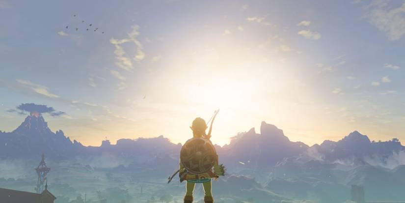 Link gazing over Hyrule in the Nintendo Switch game, The Legend of Zelda: Breath of the Wild.