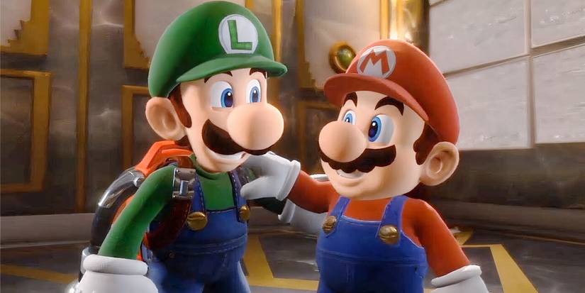 Mario and Luigi smiling at each other in the ending of Luigi's Mansion 3