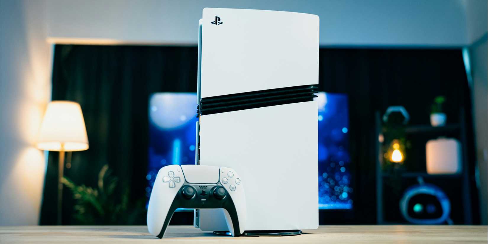 PlayStation 5 and controller propped up on a table