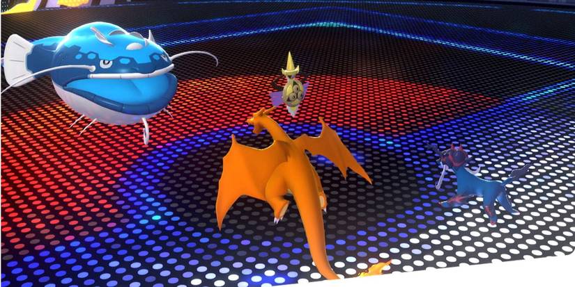 Charizard and Samurott facing Dondozo and Aegislash in Pokemon Champions