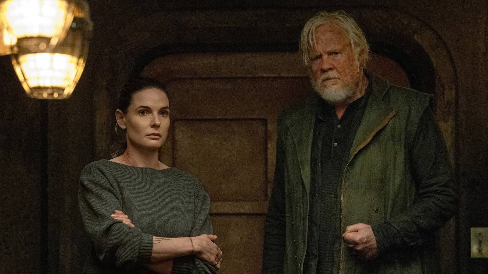 Rebecca Ferguson as Juliette Nichols and Tim Robbins as Bernard Holland in Silo Season 3.