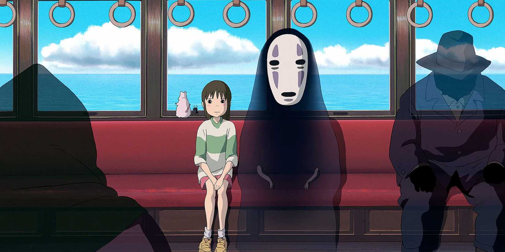 Chihiro and No-Face on a train during a scene from Spirited Away (2001)