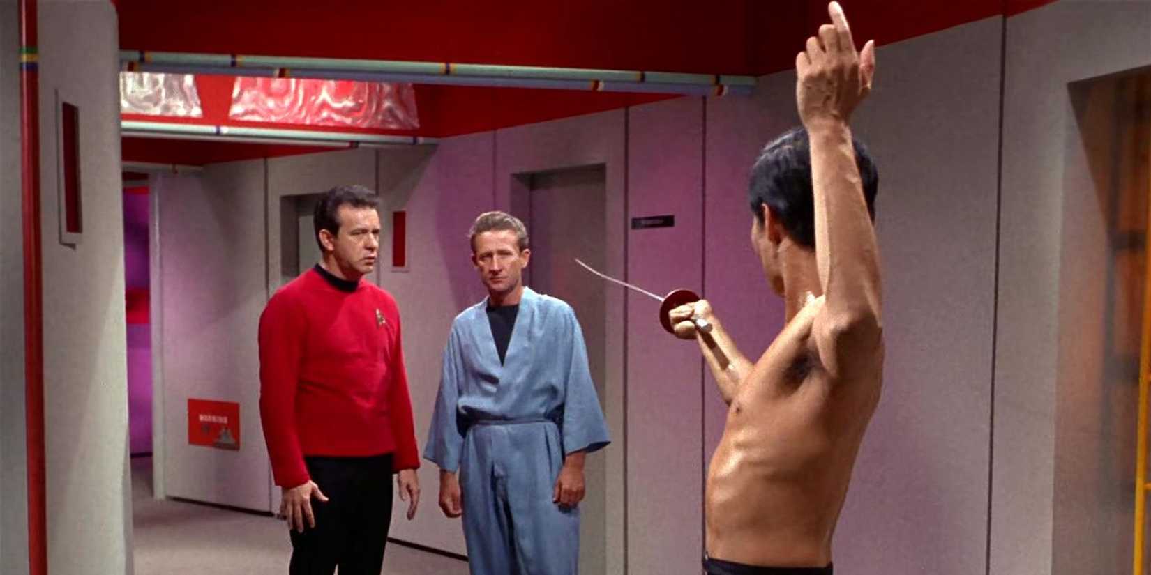 Sulu points his rapier at some crewmen