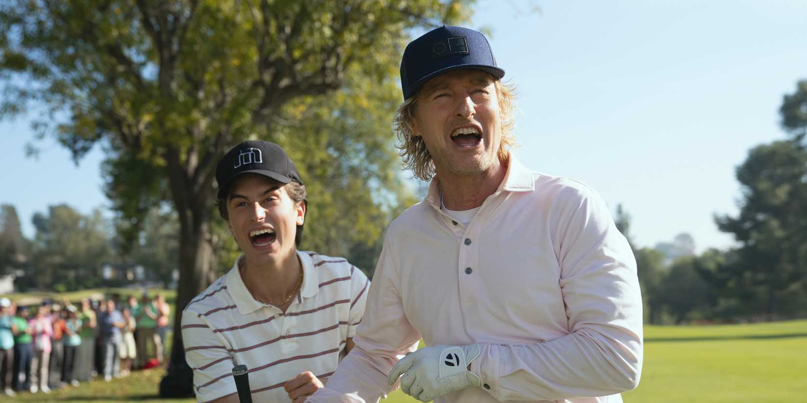 Peter Dager and Owen Wilson getting excited on the golf course in Stick Season 2