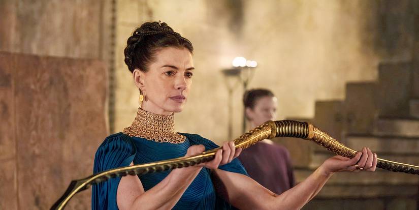 Penelope holding up Odyssey's bow during the end of Christopher Nolan's The Odyssey