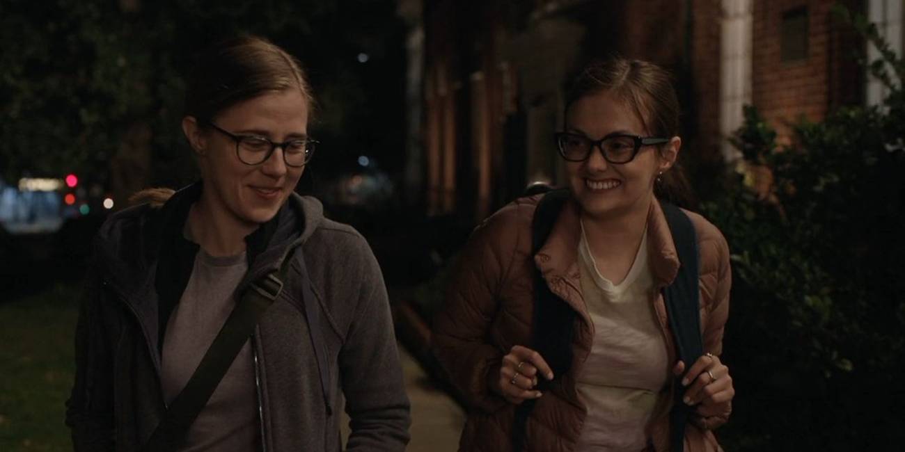 Mel (Taylor Dearden) and Becca (Tal Anderson) walking down the street in 'The Pitt' Season 1 finale.