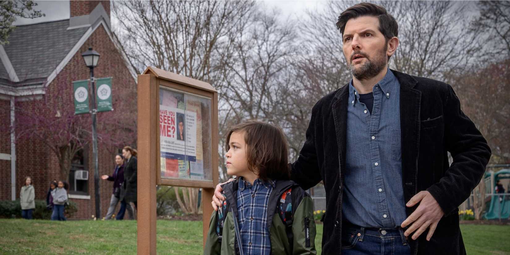 Adam-Scott with a small boy outside a school in The-Whisper-Man