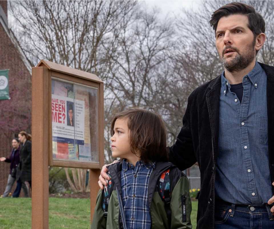 Adam-Scott with a small boy outside a school in The-Whisper-Man