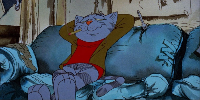 Fritz lounging on a sofa with a cigarette in his mouth in 'The Nine Lives of Fritz the Cat' (1974)