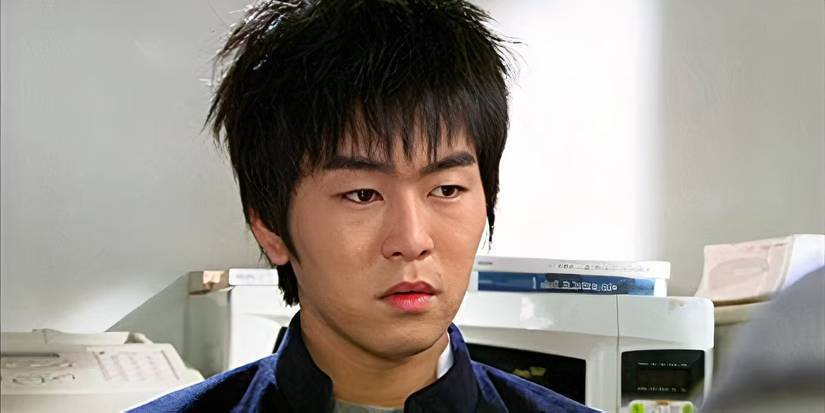 Kwak Jung-wook staring ahead with a serious expression in a close-up scene from White Christmas